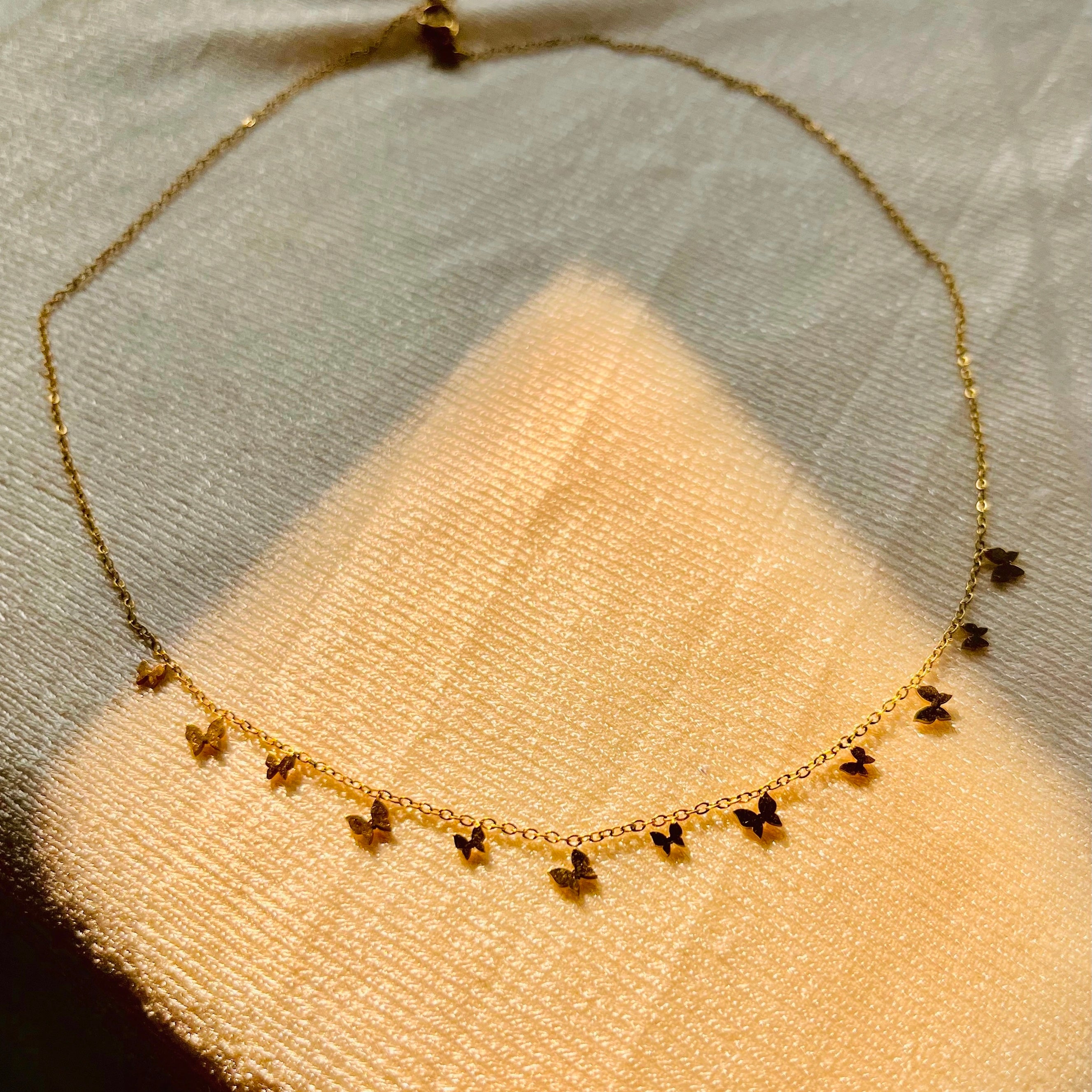 Titili charm necklace