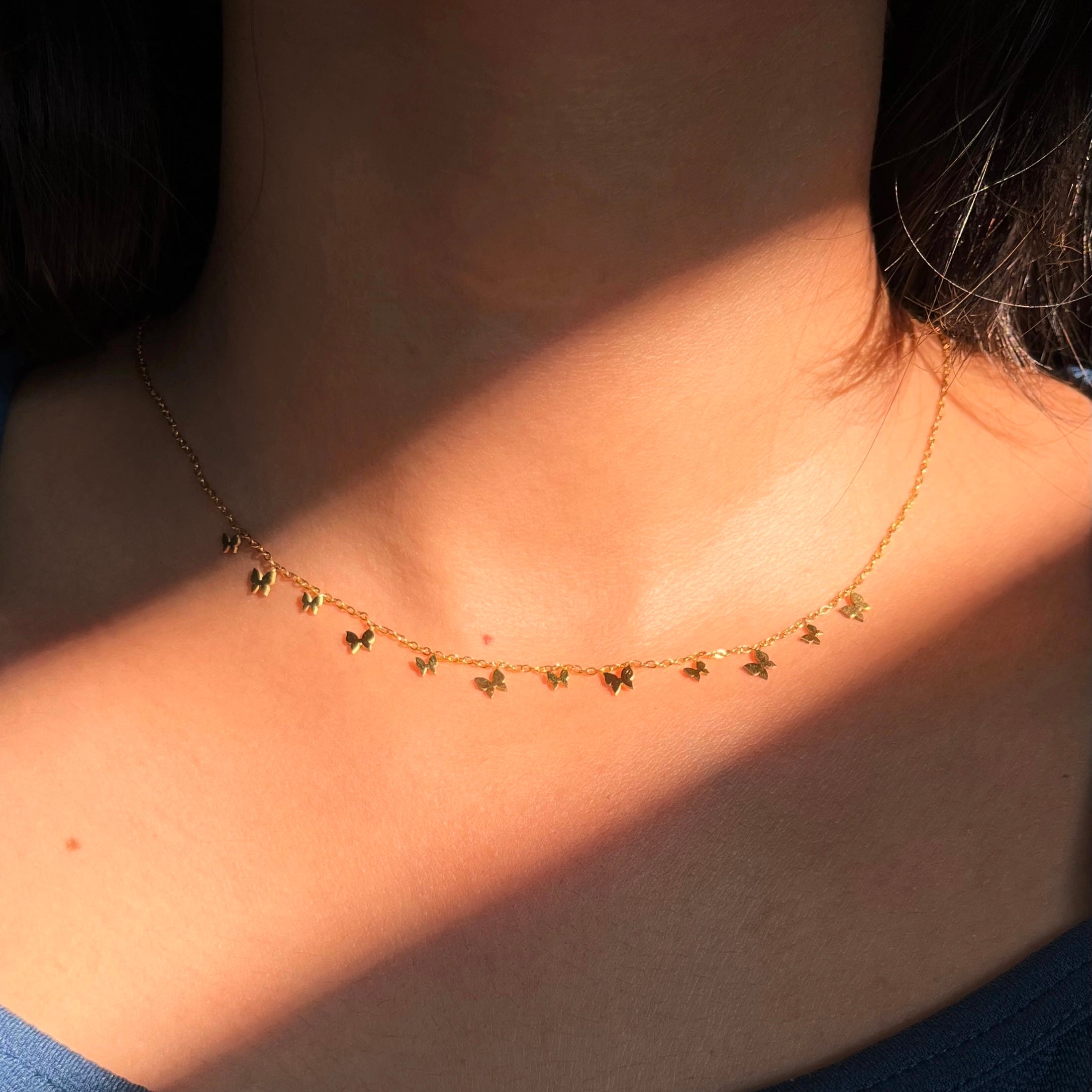 Titili charm necklace